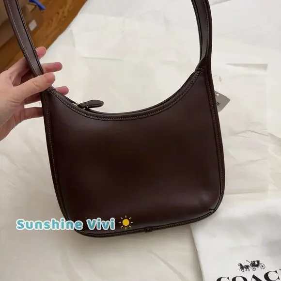 NWT Coach Curve Zip Bag in BRASS/Maple Glovetanned Leather CAF11